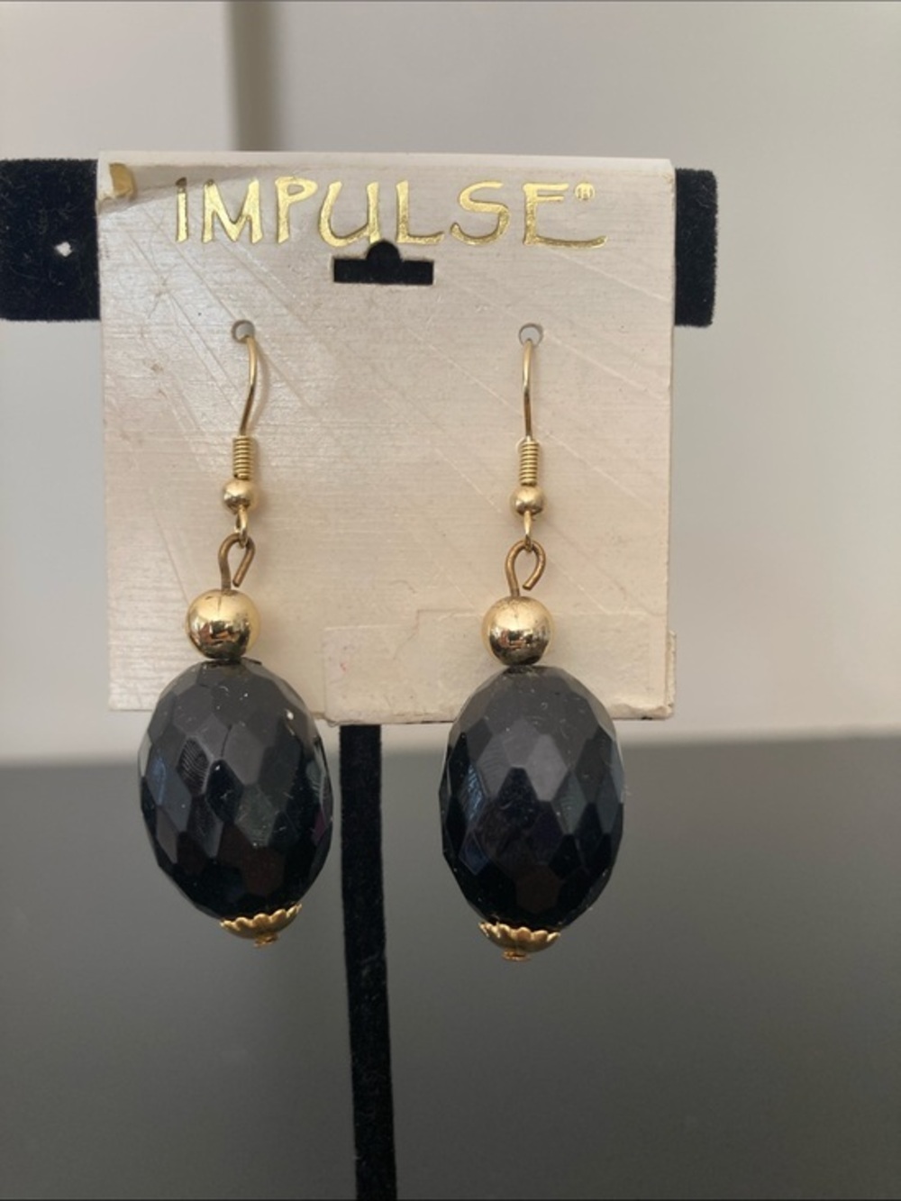 Impulse Gold Accented Black Faceted Drop Earrings